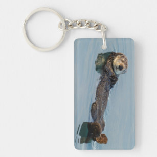 Zee otter die op de rug drijft sleutelhanger