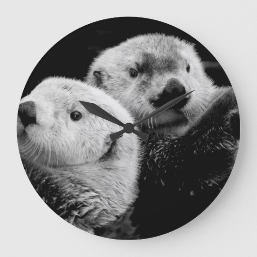 Zee otters: zwart wit paar. grote klok (Voorkant)