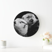 Zee otters: zwart wit paar. grote klok (Huis)