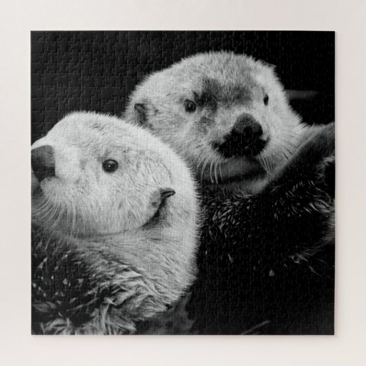 Zee otters: zwart wit paar. legpuzzel (Verticaal)