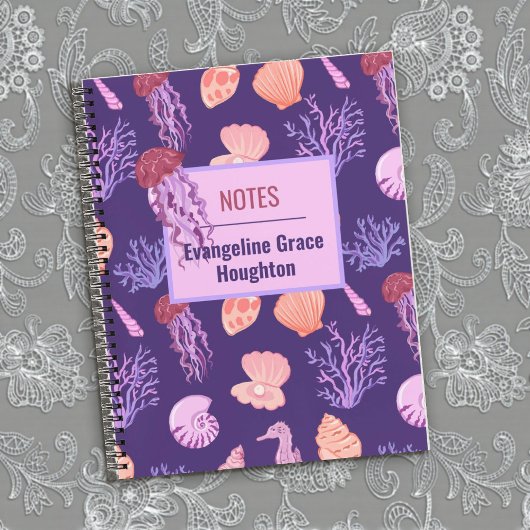 Zeeduivel en schelpen, paars notitieboek