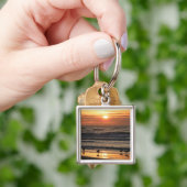 Zeegarren door de oceaan bij de zon sleutelhanger (Hand)