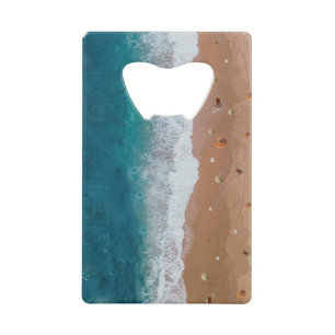 ZEEGEZICHT STRAND SCHELPEN ZOMERVAKANTIE CREDITKAART FLESSENOPENER