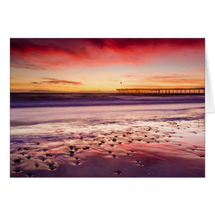 Zeekap en pier bij zonsondergang, CA