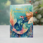 Zeemeermin Zeepaardje Santa Zee Nautische Kerst Folie Feestdagenkaart<br><div class="desc">Stuur uw 'Zeeen & Groeten' in glinsterende stijl met dit betoverende nautische thema echte folie kerstkaart. Met een onder het zee waterverf schilderij met een zeemeermin,  een zeepaardje in een kerstmuts en een tropische vis en koraal. Kunst van KL Stock</div>