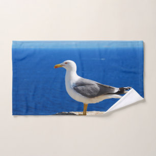 Zeemeeuw bij de strand handdoek
