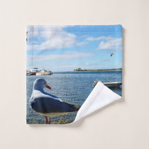 Zeemeeuw en boten op oceaan, washandje