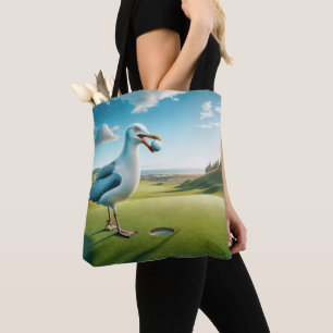 Zeemeeuw met een golfbal in zijn snavel tote bag