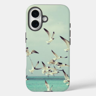 Zeemeeuwen die over de oceaan vliegen iPhone 16 hoesje