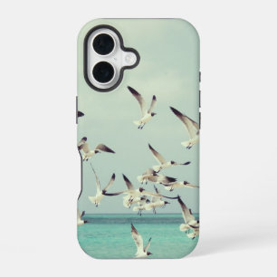 Zeemeeuwen die over de oceaan vliegen iPhone 16 hoesje