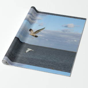 Zeemeeuwen tijdens de vlucht cadeaupapier