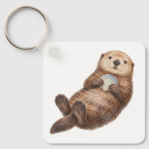 Zeeotter met een schelpen sleutelhanger