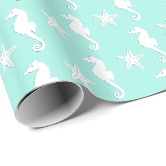 Zeepaard en zeester - wit op bleke aqua cadeaupapier (Rol Hoek)