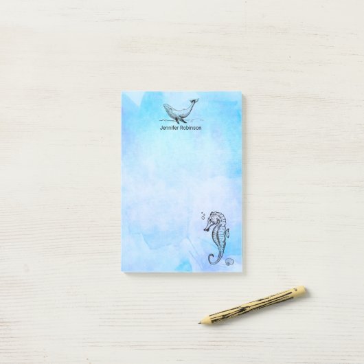 Zeepaardje, walvis en zeeschok op blauwe Waterverf Post-it® Notes (Op bureau)