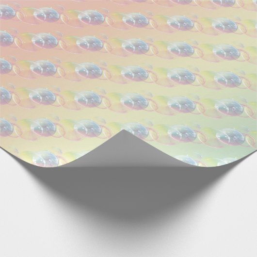 Zeepbellen op pastelregenboog cadeaupapier (Hoek)