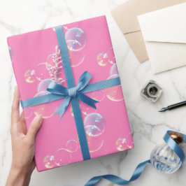 zeepbellen op roze cadeaupapier