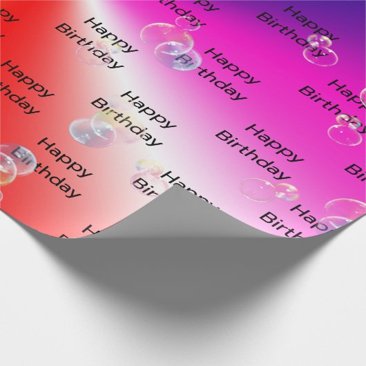 zeepbelletjes op regenboogspectrum cadeaupapier (Hoek)