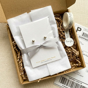 Zeer eenvoudige witte en gouden oorbel display kaa visitekaartje