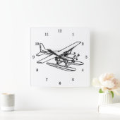 Zeer wollig vliegtuig op drijvende wandklok (Huis)