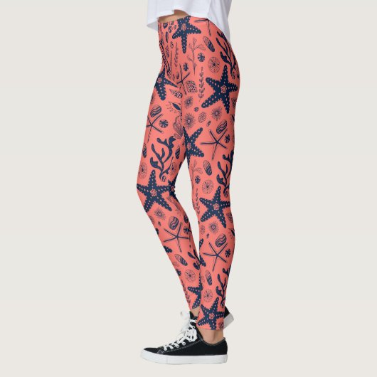 Zeeschalen levende koraalachtergrond leggings (Links)