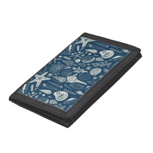 Zeeschalen op donkerblauw drievoud portemonnee
