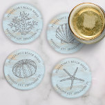 zeeschelp Koraal Aangepast Onderzetter Set<br><div class="desc">Super schattige set van onderzetters met stijl zee graphics - een schaal, zee egel, zeester, en koraal alles ingesteld tegen een verweerde blauwe houten achtergrond. Voeg twee regels aangepaste tekst toe om te personaliseren. Perfect voor een strandhuis, vakantiewoning, nautische strandhuisje, strandbruiloft en meer - geweldig als een huis verwarmend cadeau...</div>