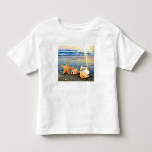 Zeeschelpen en zeesterkreeft op het strand kinder shirts (Voorkant)