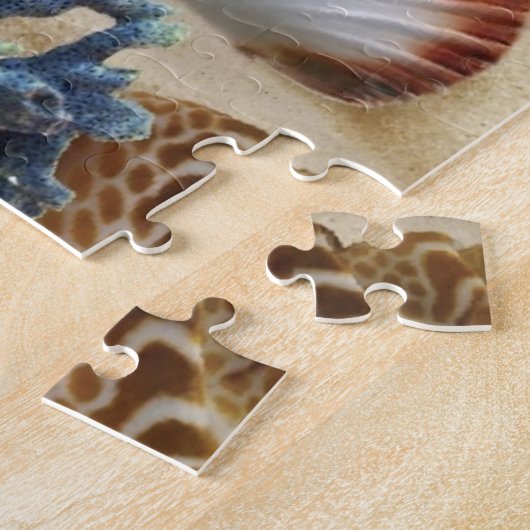 Zeeschelpen op het strand legpuzzel (Zijkant)