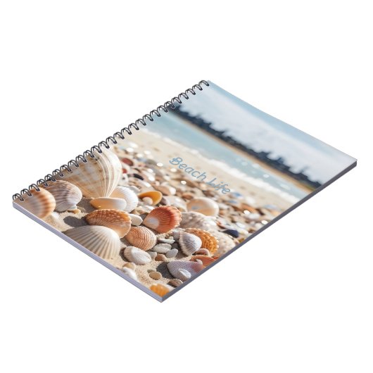 Zeeschelpen op het strand notitieboek (Linkerzijde)