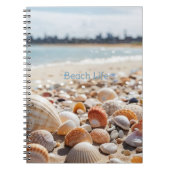 Zeeschelpen op het strand notitieboek (Voorkant)