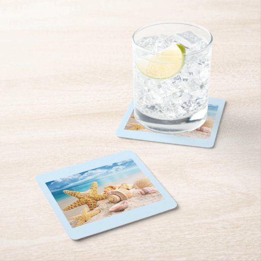 Zeeschelpen op het strand papieren onderzetters (Insitu)