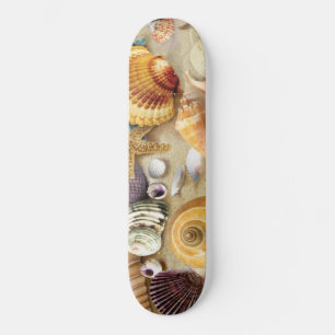 Zeeschelpen op het strand persoonlijk skateboard