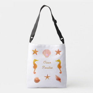 Zeeschelpen, sterrenkalligrafie en zeepaarden op w crossbody tas