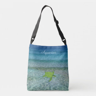 Zeeschildpad op het strand en kalligrafie crossbody tas
