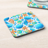 Zeeshells en zeeduivel bier onderzetter (Linkerzijde)