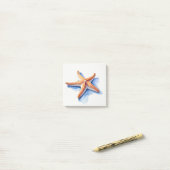 Zeester en blauw silhouet post-it® notes (Op bureau)