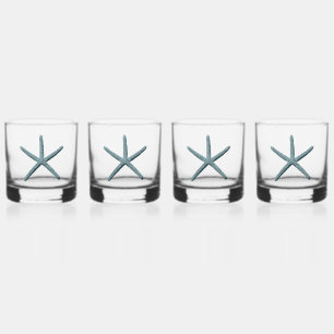 Zeester met blauwe vinger whisky glas