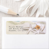 Zeester op het strand Blauwgroen Zee Wateruitnodig Etiket (Insitu)