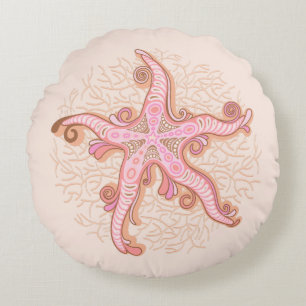 Zeesterren en koraalroze pastelpatroon rond kussen