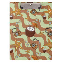 Zeesterren, kokosnoten en camera's klembord