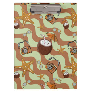 Zeesterren, kokosnoten en camera's klembord