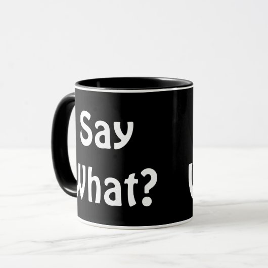 Zeg wat? Koffiebeker. Mok (Voorkant links)