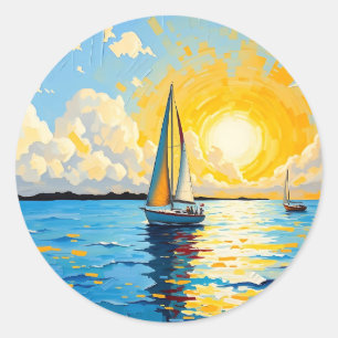 Zeilboot bij zonsondergang ronde sticker
