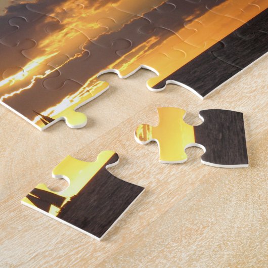 Zeilboot tegen zonsondergang legpuzzel (Zijkant)