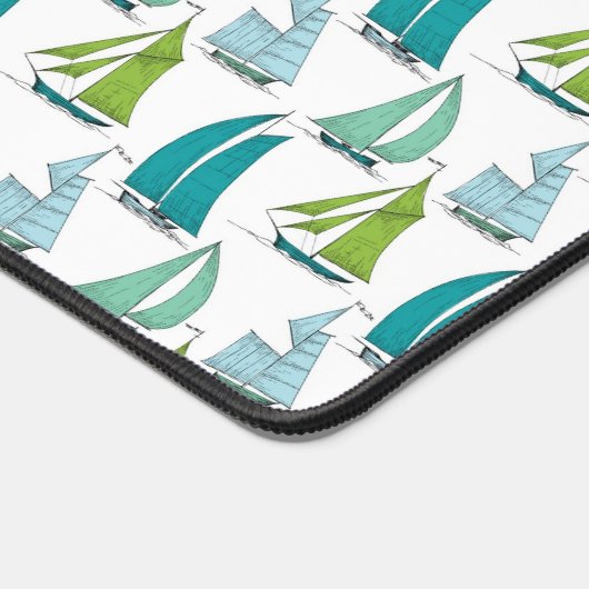 Zeilboten op het waterpatroon bureaumat (Hoek)