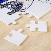 Zeiler met bel staand bij kustvuurtoren legpuzzel (Zijkant)