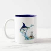 Zeilvis neemt het aas tweekleurige koffiemok (Links)