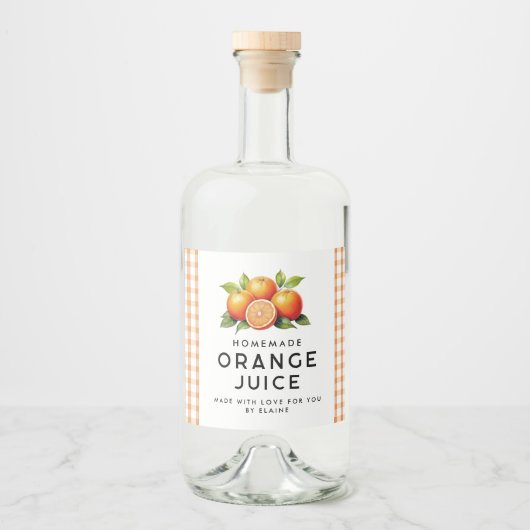 Zelfgemaakt oranje sap met sinaasappels en bladere likeurfles etiket (Voorkant)