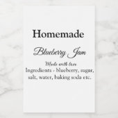 Zelfgemaakte bosbessen jam gemaakt met liefde en t voedselcontainer etiket (Enkel label)