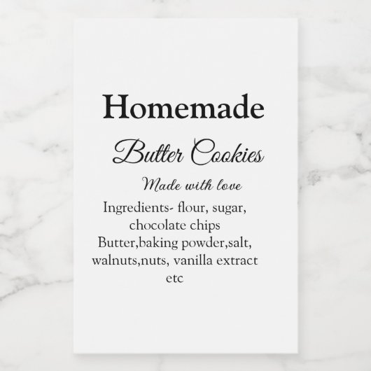 Zelfgemaakte boterkoekjes gemaakt met liefde en te voedselcontainer etiket (Enkel label)